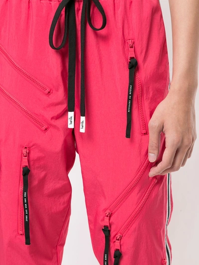 Shop Haculla Multi-zip Track Trousers In Pink