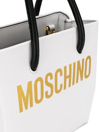 Shop Moschino Logo Mini Bag In White