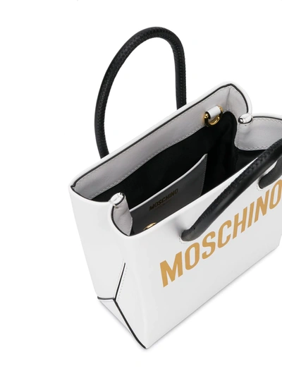 Shop Moschino Logo Mini Bag In White