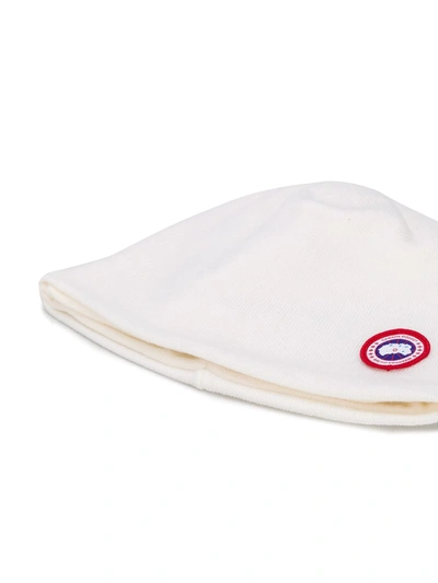 Shop Canada Goose Logo-patch Knitted Beanie In White