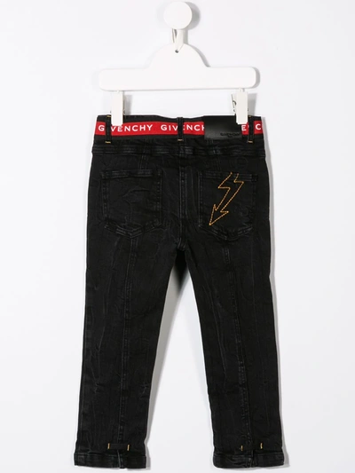 Shop Givenchy Front Seam Slim Jeans In Black