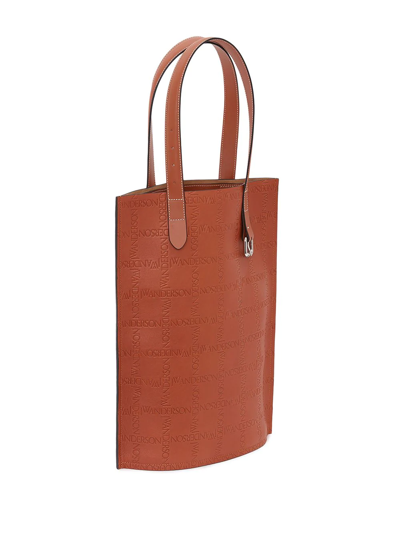 Shop Jw Anderson Debossed-logo Tote Bag In Brown