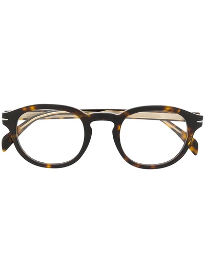 Shop David Beckham Eyewear Db 7017 Round Frame Glasses In Brown