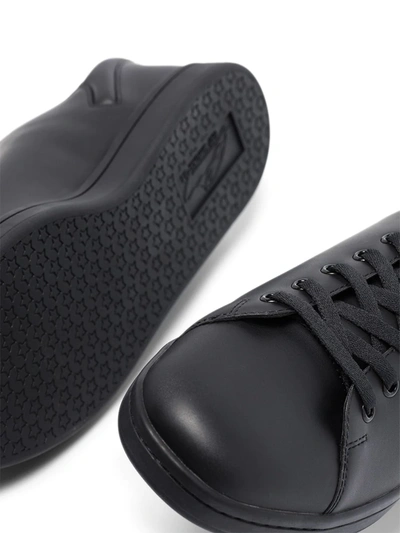 Shop Raf Simons Orion Low-top Leather Sneakers In Black