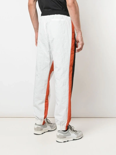 Shop God's Masterful Children Striped Track Trousers In White