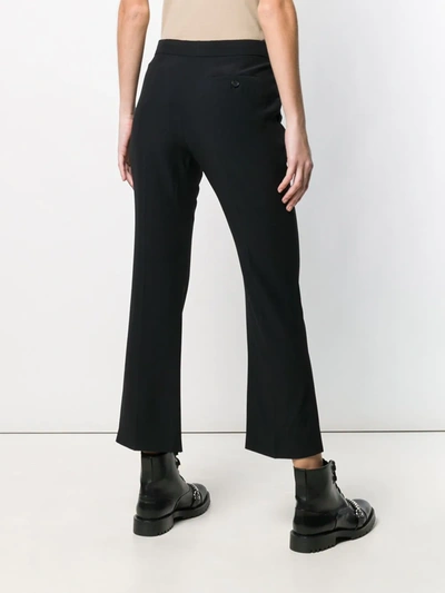 Shop Alexander Mcqueen Front Split Trousers In Black