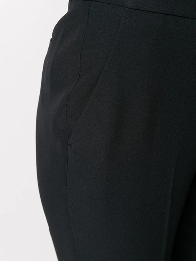 Shop Alexander Mcqueen Front Split Trousers In Black