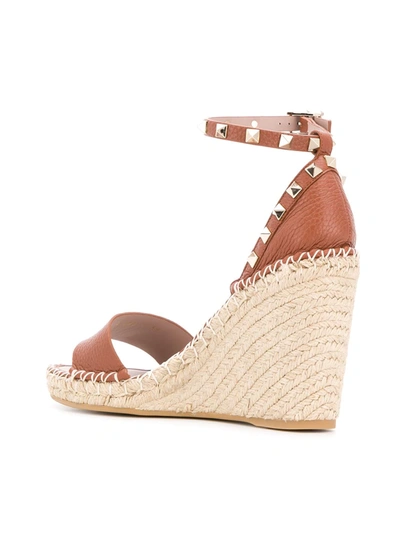 Shop Valentino Rockstud Double Wedge Sandals In Brown