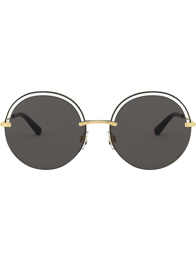 Shop Dolce & Gabbana Cut-out Detail Round Sunglasses In Black