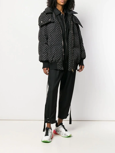 Shop Stella Mccartney Optical Monogram Quilted Jacket In Black