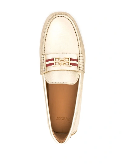 Shop Bally Metallic Leather Loafers In Gold