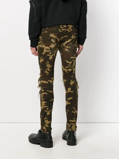 Shop Balmain Distressed Camouflage Trousers In Green