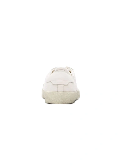 Saint Laurent Logo Print Low Top Sneakers In Neutral