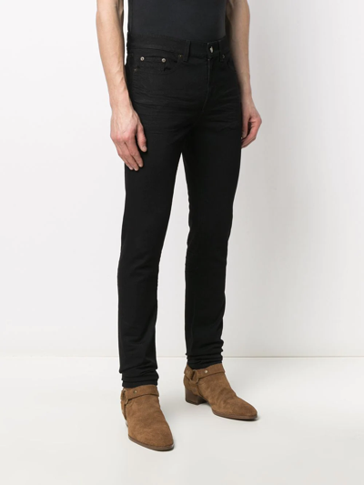 Shop Saint Laurent Five Pocket Slim-fit Jeans In Black