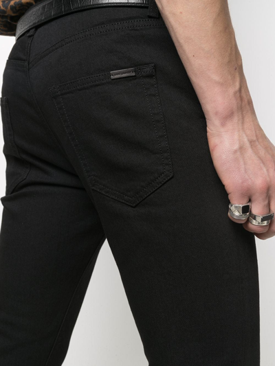 Shop Saint Laurent Five Pocket Slim-fit Jeans In Black