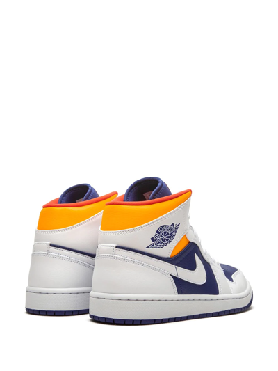 Shop Jordan Air  1 Mid "royal Blue/laser Orange" Sneakers