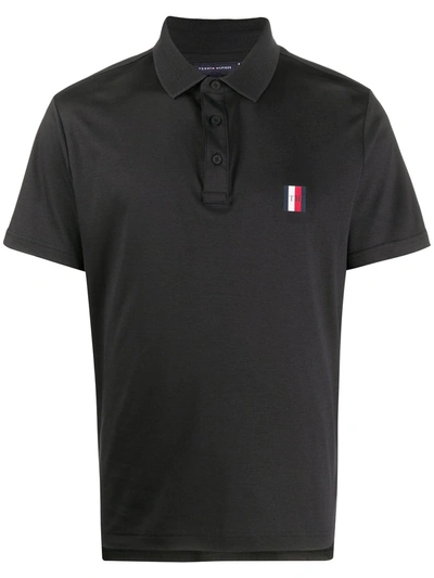 Shop Tommy Hilfiger Logo-embroidered Polo Shirt In Black