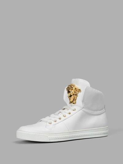Shop Versace Men's White Sneakers With Gold Medusa Detail