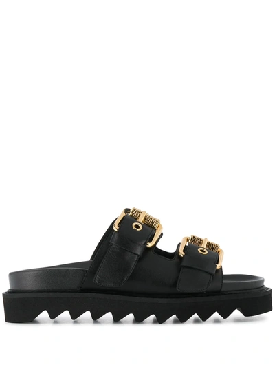 Shop Moschino Buckled Slip-on Sandals In Black