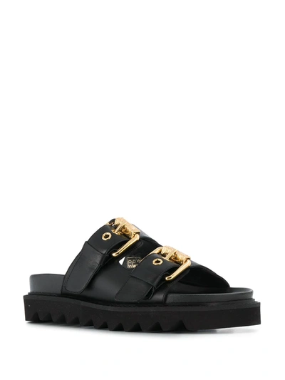 Shop Moschino Buckled Slip-on Sandals In Black