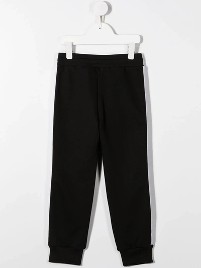 Shop Givenchy Branded Track Pants In Black