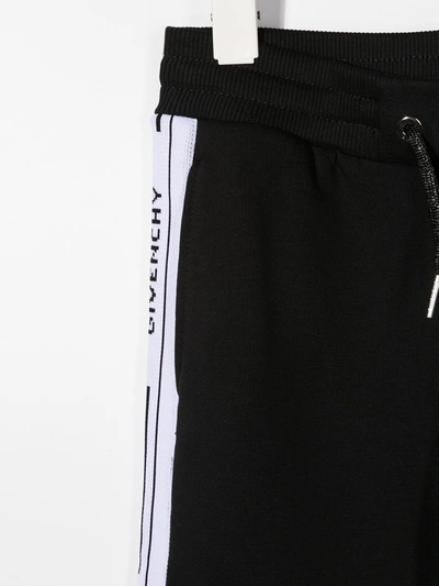 Shop Givenchy Branded Track Pants In Black