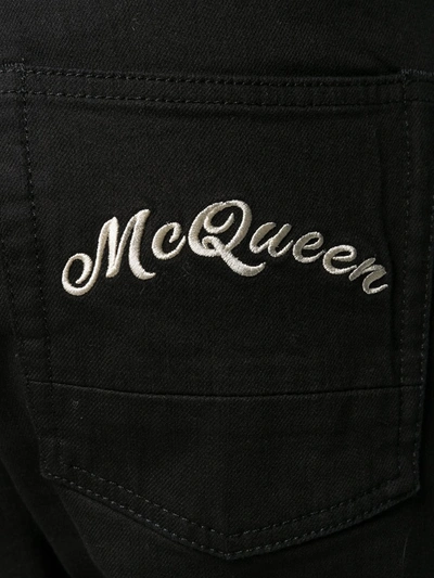 Shop Alexander Mcqueen Logo Embroidered Slim Jeans In Black