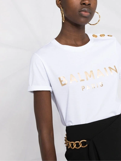 Shop Balmain Metallic-logo Button-embellished T-shirt In White