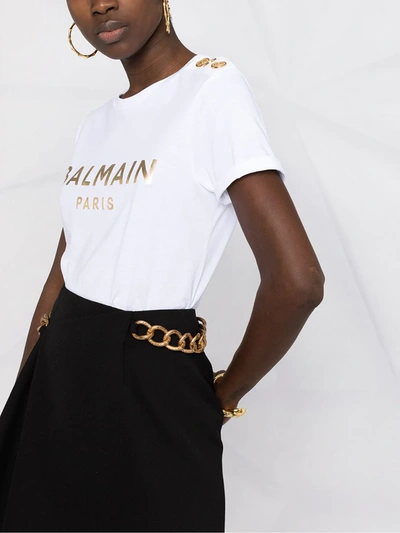 Shop Balmain Metallic-logo Button-embellished T-shirt In White