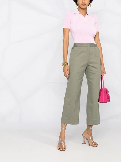 Shop Jacquemus Cropped Trousers In Green