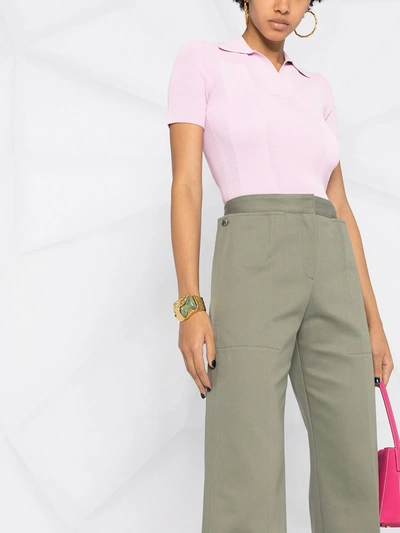 Shop Jacquemus Cropped Trousers In Green