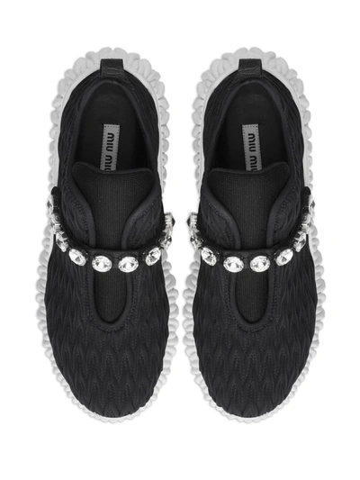 Shop Miu Miu Matelassé Crystal-embellished Sneakers In Black