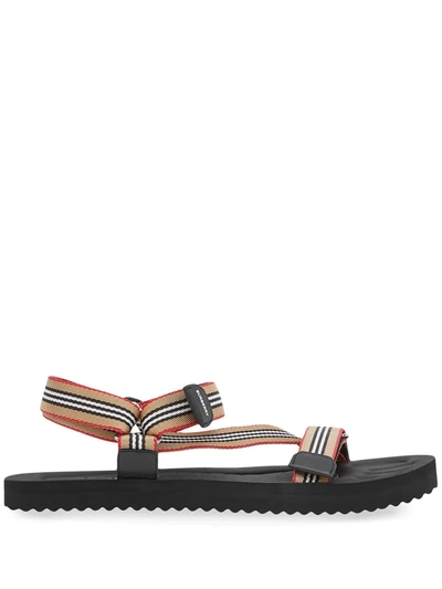 Shop Burberry Icon Stripe Sandals In Black