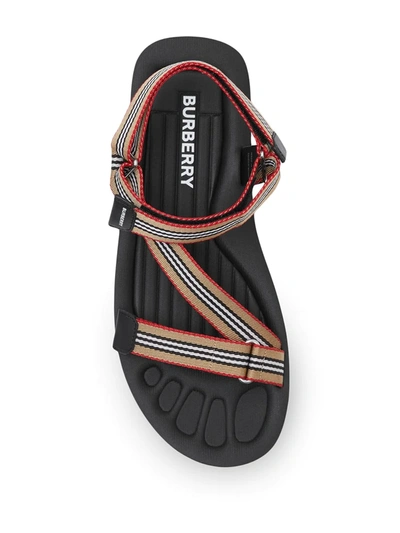 Shop Burberry Icon Stripe Sandals In Black