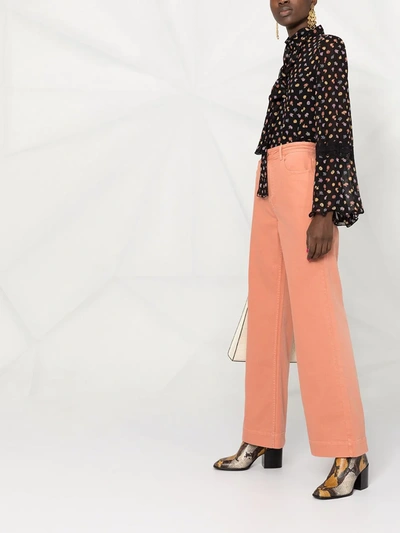 Shop Ulla Johnson Theo Flared Jeans In Pink