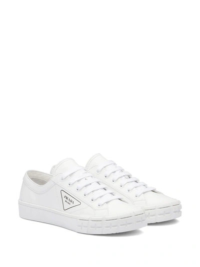 Shop Prada Logo Print Low-top Sneakers In White