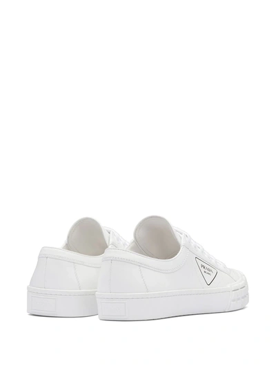 Shop Prada Logo Print Low-top Sneakers In White