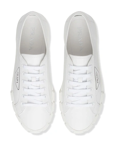 Shop Prada Logo Print Low-top Sneakers In White