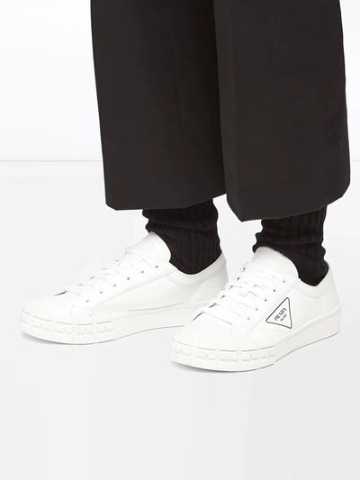 Shop Prada Logo Print Low-top Sneakers In White
