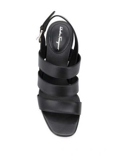 Shop Ferragamo Three-strap Sandals In Black
