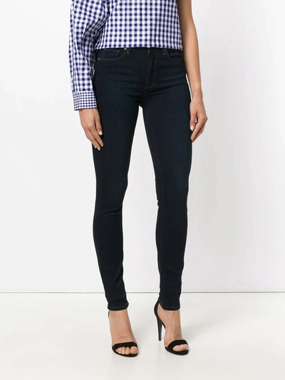 Shop Paige Skinny Jeans In Blue
