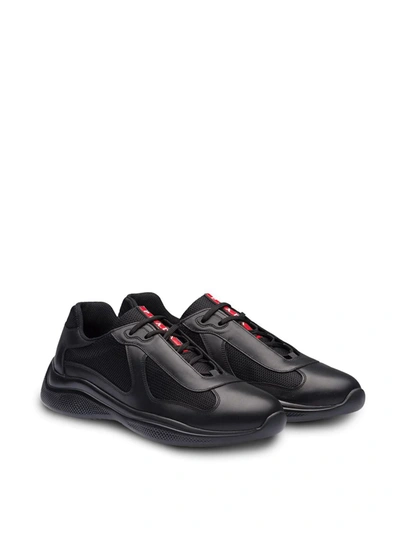 Shop Prada Low Top Sneakers In Black