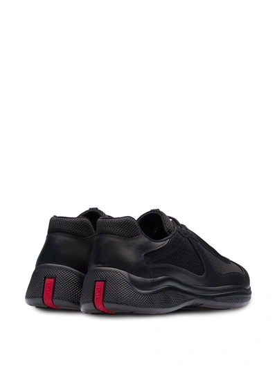 Shop Prada Low Top Sneakers In Black