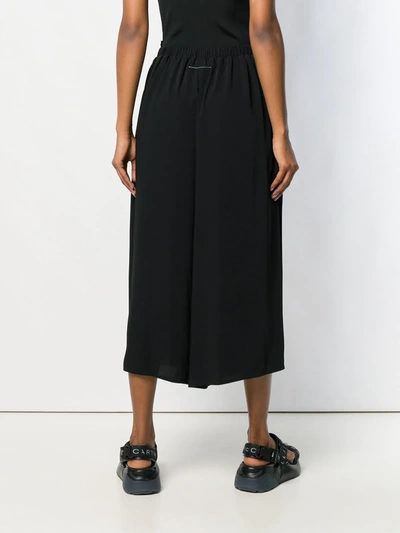 Shop Mm6 Maison Margiela Pleated Palazzo Trousers In Black