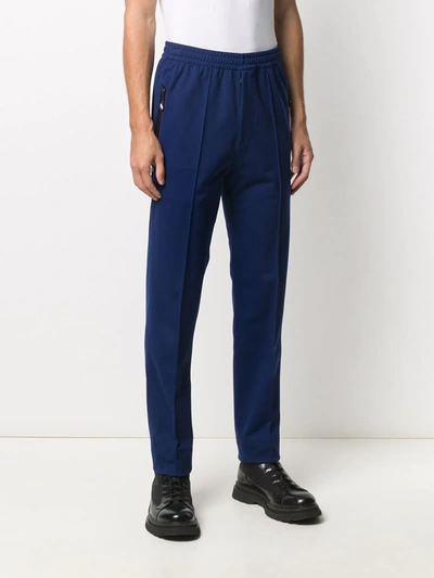 Shop Moncler Tapered Piped-trim Track Pants In Blue