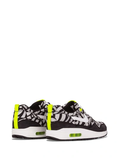 Shop Nike Air Max 1 Sneakers In Black
