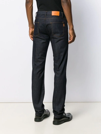 Shop Sandro Slim-cut Raw Jeans In Blue