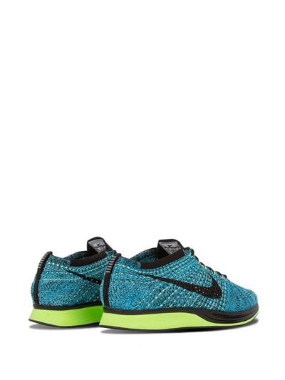 Shop Nike Flyknit Racer Sneakers In Blue