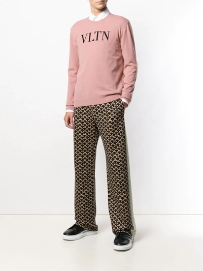 Shop Valentino Scale Pattern Track Pants In Brown