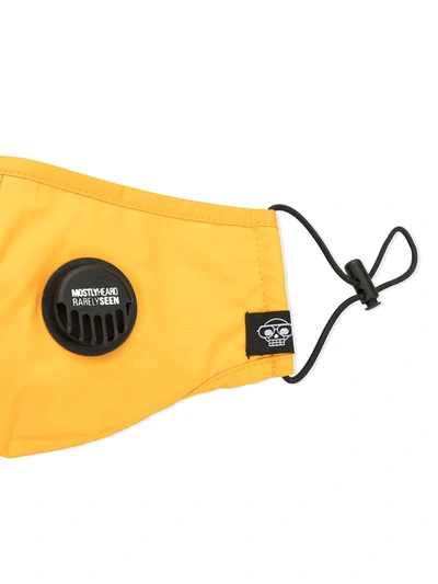 Shop Mostly Heard Rarely Seen Logo Patch Face Mask In Yellow